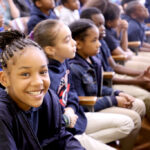 Students Sitting in Auditorium